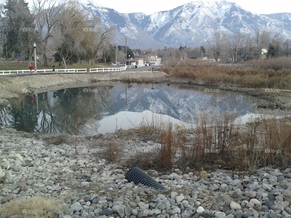 over flow reflections. reflections of over flow at Salem pond Utah