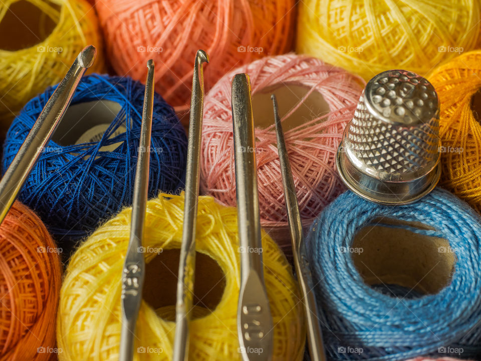 Knitted needles on thread