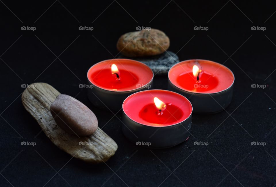red candles on black background