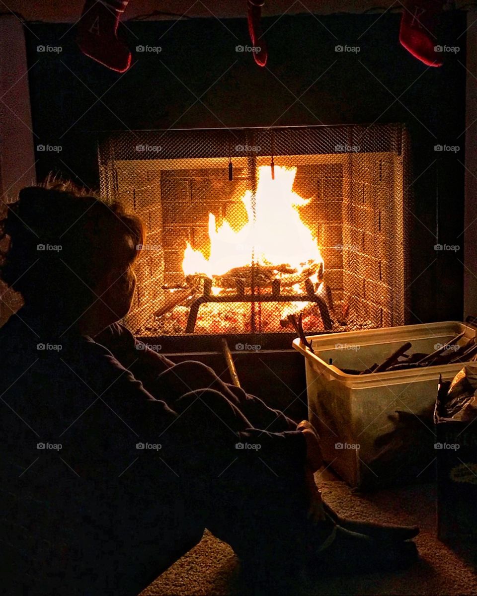 Sitting by the warm fire on a cold winters night 