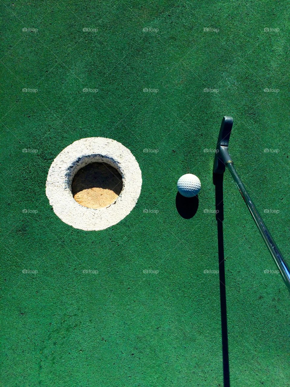 High angle view of golf and putter