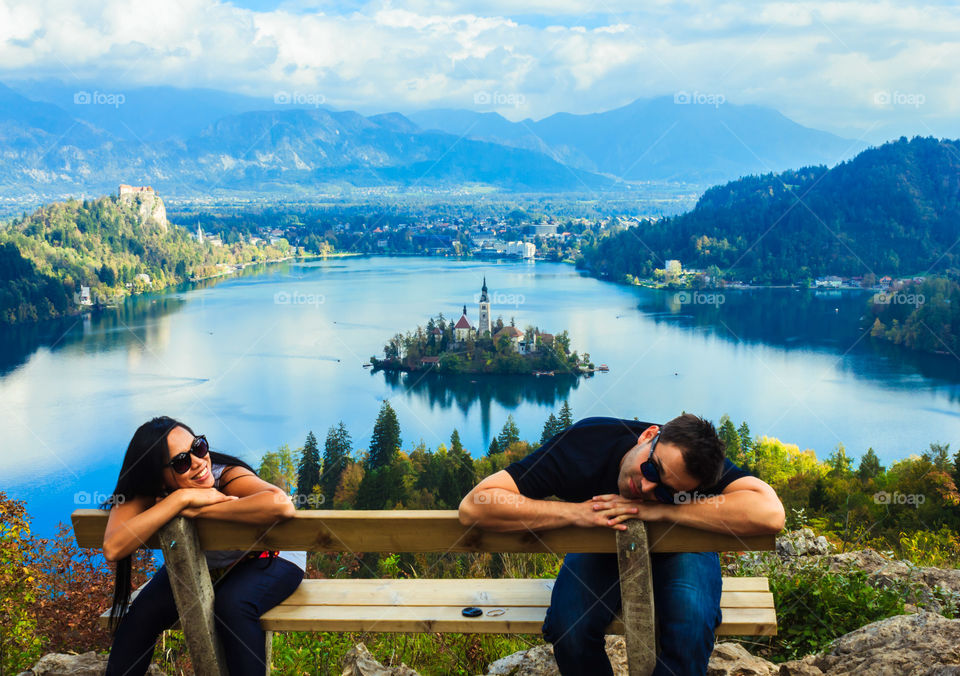 Happy couple and a fantastic view of lake Bled