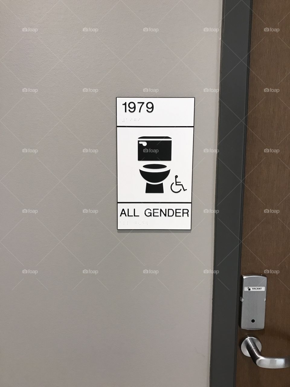 All gender bathroom sign in a building