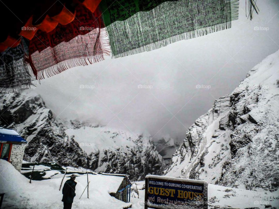 The snowy view from Machapuchare Base Camp. A blizzard came in and kept us there an extra day or so. Photo taken on the Annapurna Base Camp Trek in Nepal.