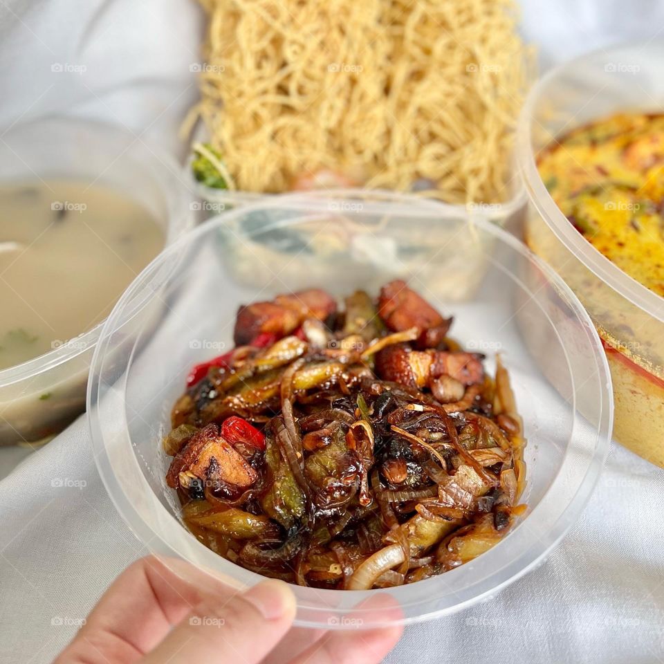 Asian food includes lala clam soup, curry fish head, bitter gourd pork and crispy twin tower noodles 