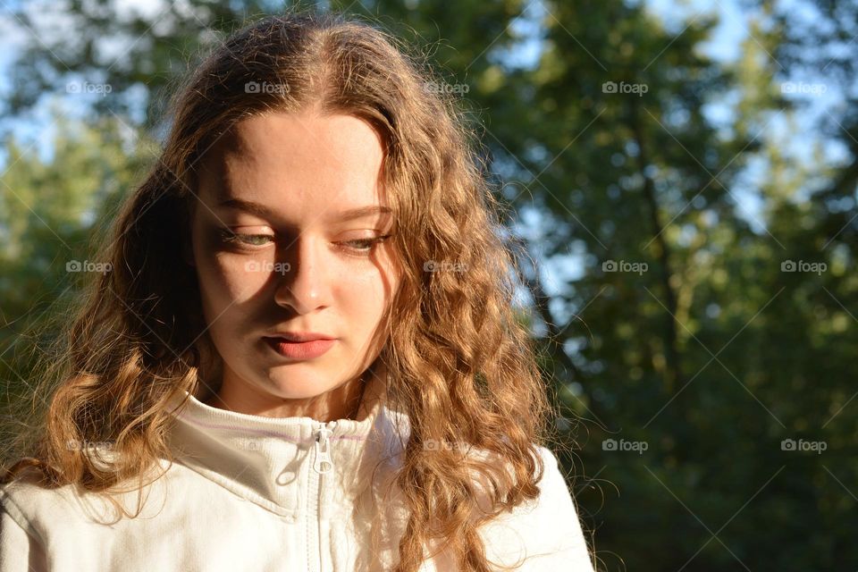 young girl beautiful portrait in sunlight