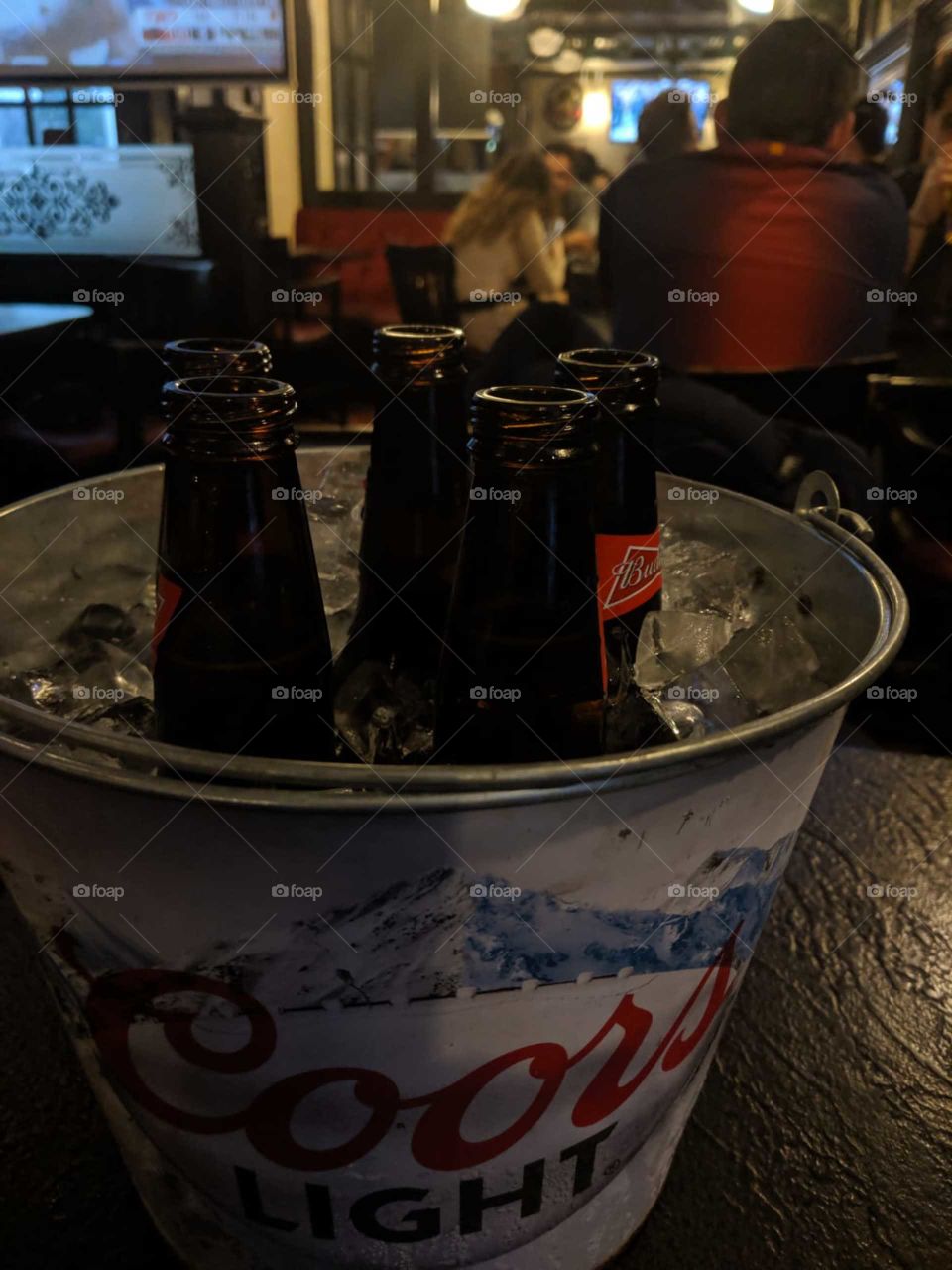 Spring is here! Having some Coors light at a bar!