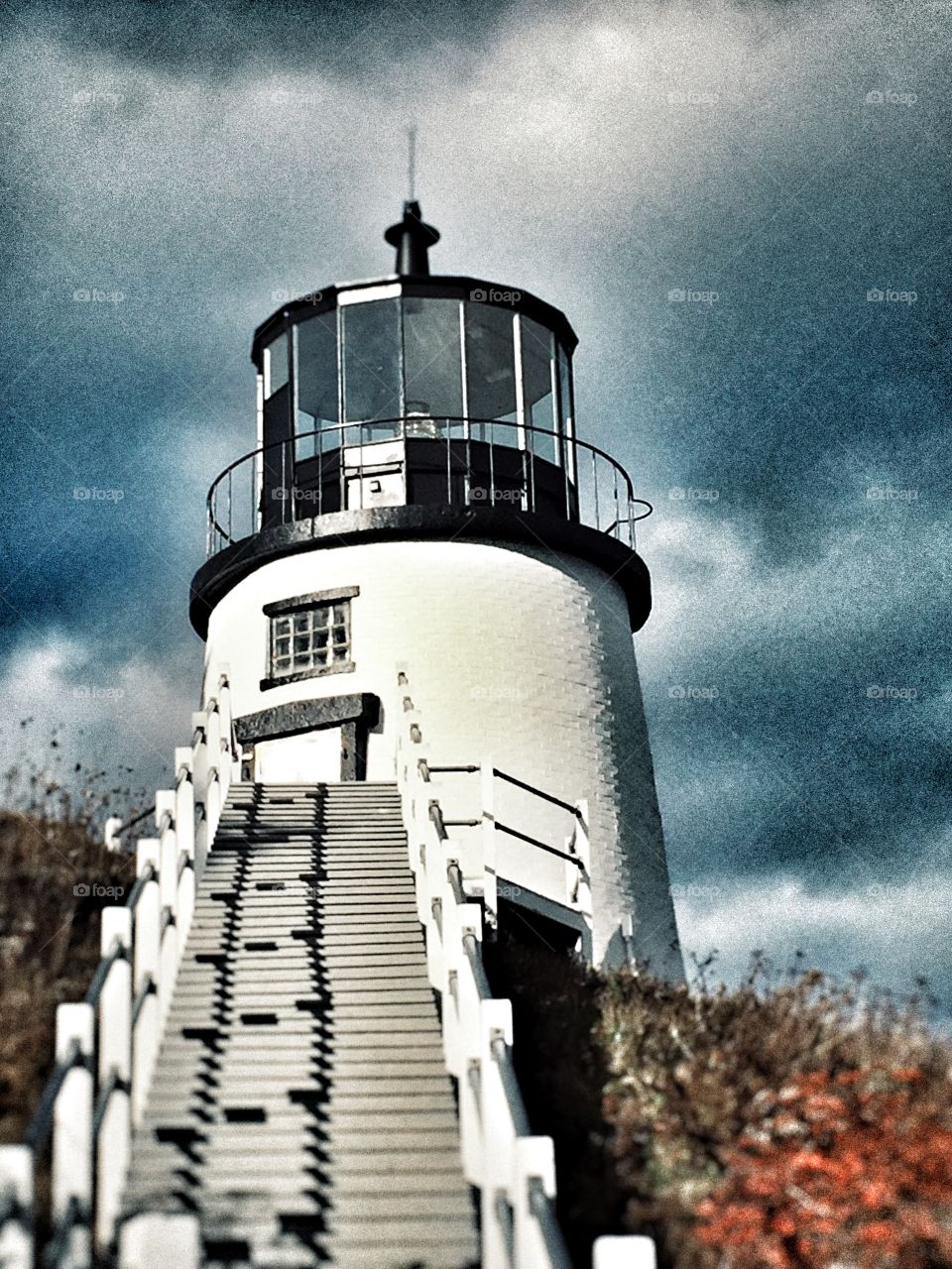 New England Lighthouse under gray skies