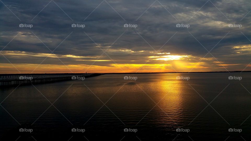 Dramatic sky over sea during sunset