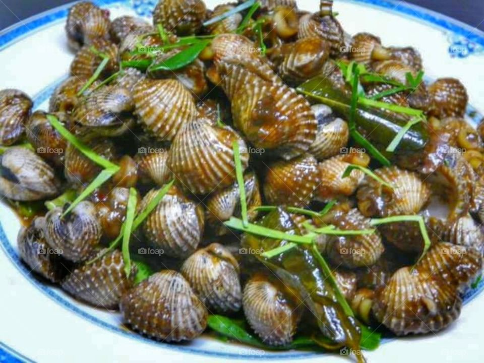 Cockles in oyster souce..