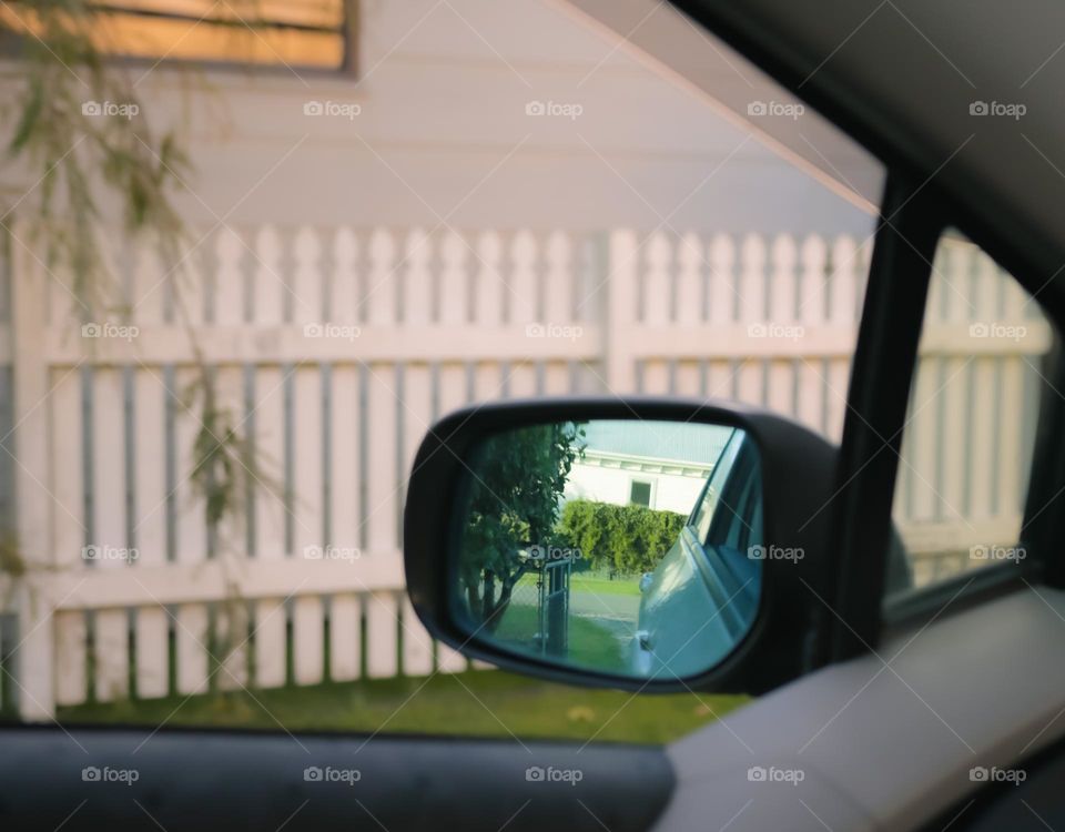 reflection through car mirror