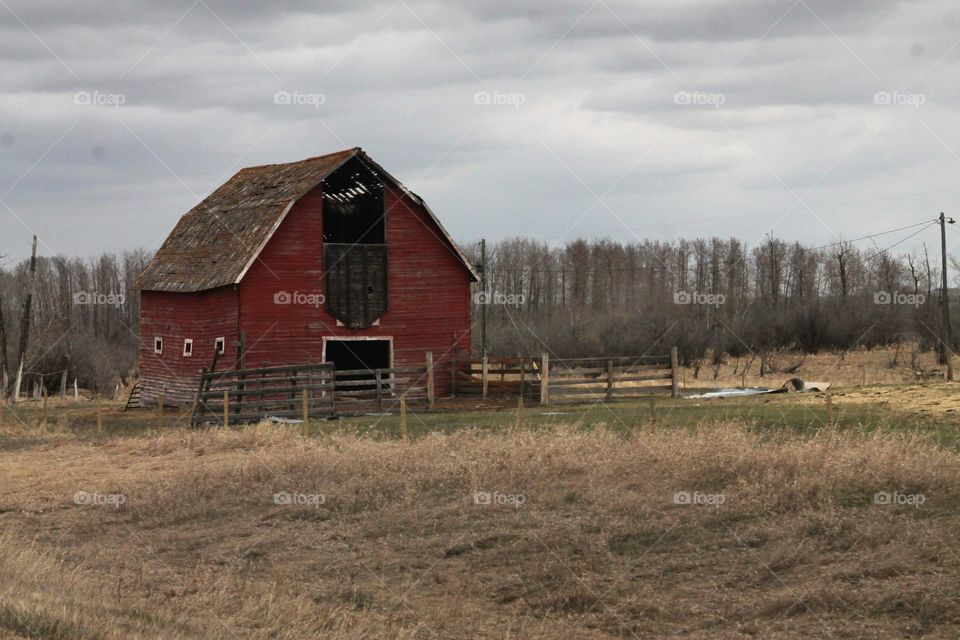 old red barn on a farm