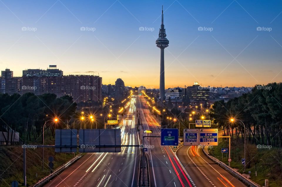 Highway at nightfall in the city