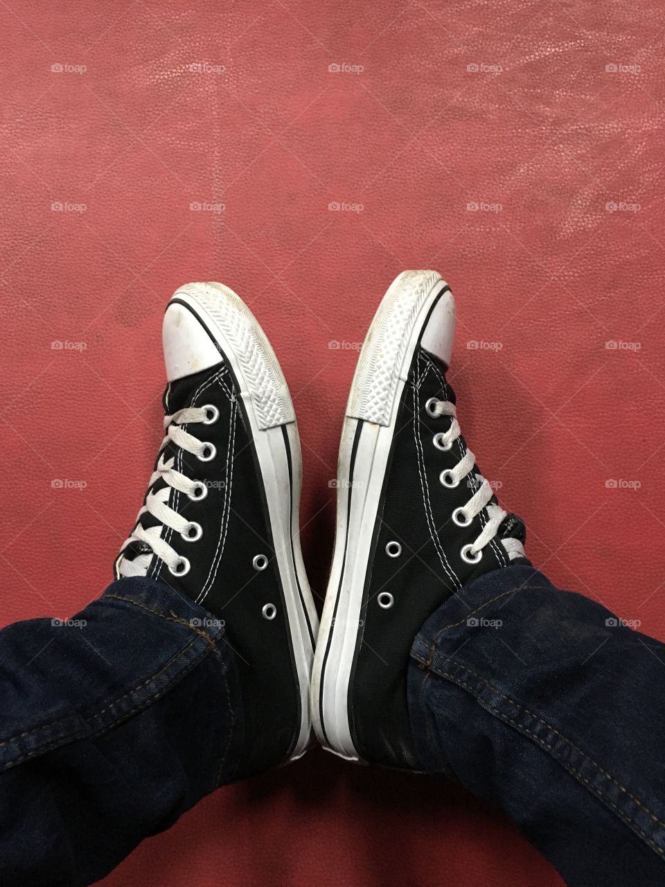 Canvas Sneakers on Red Background