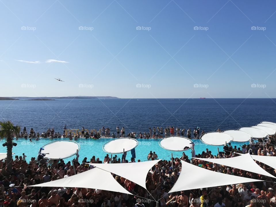 people dancing in a nightclub in Bugibba (Malta)