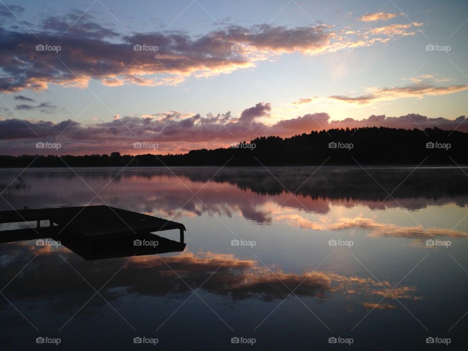 Pink sunrise over the lake in Poland 