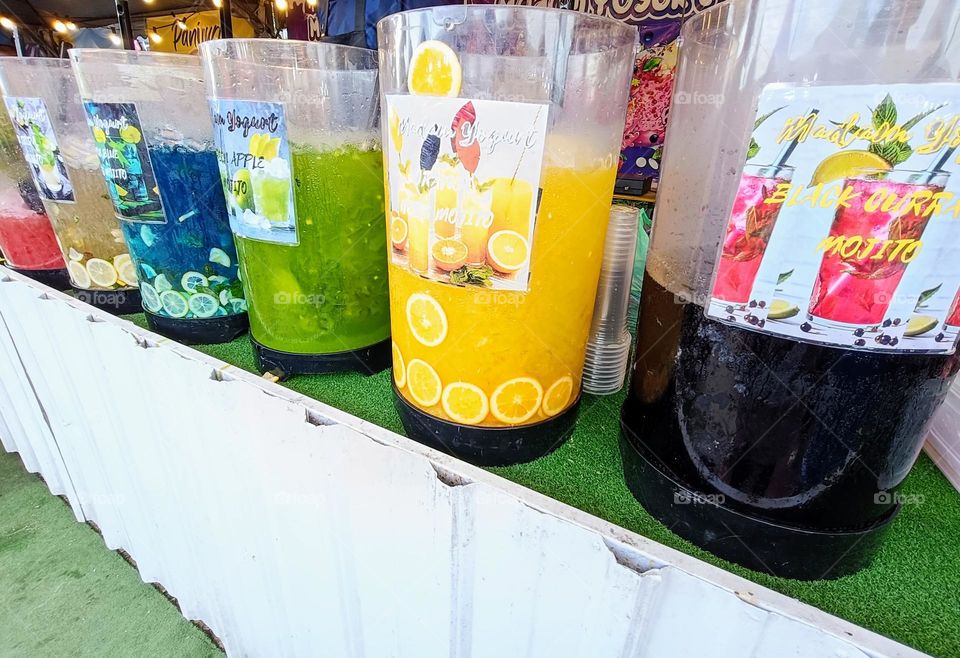 Colorful juice on display.