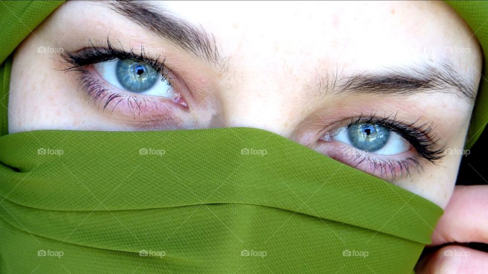 A girl with Beautiful green eyes.