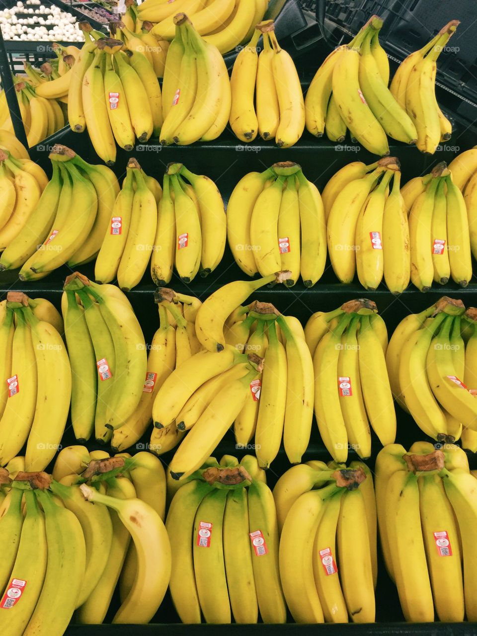 Bright sunny bananas in the supermarket