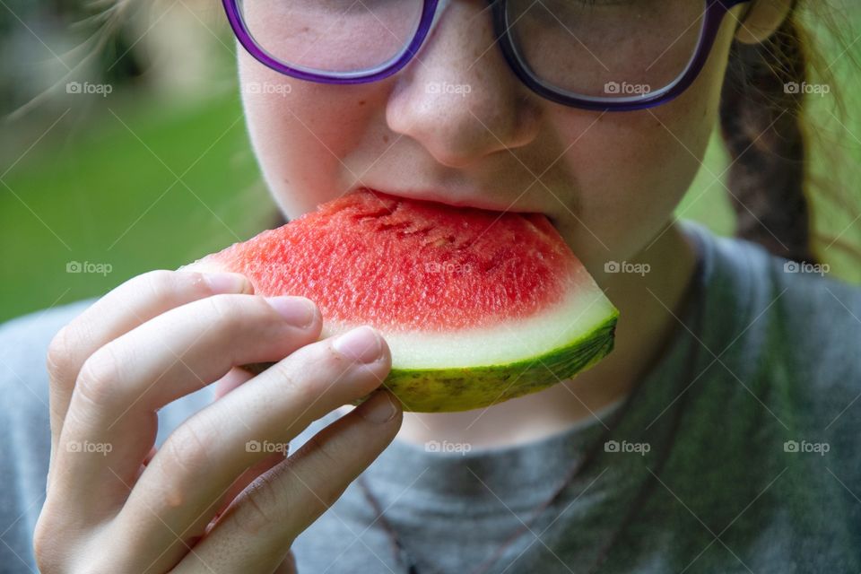 Girl eating Watermelon 