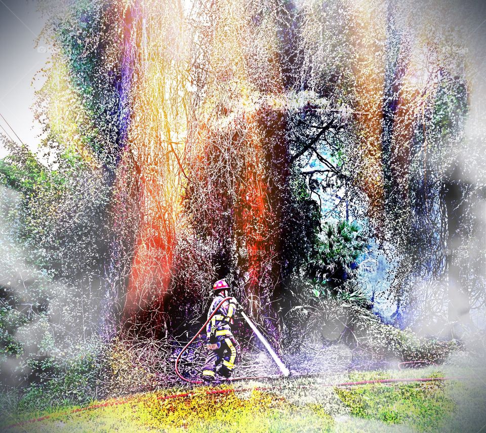 Fireman extinguishing fire. Lightning fire and fireman doing his heroic work. 