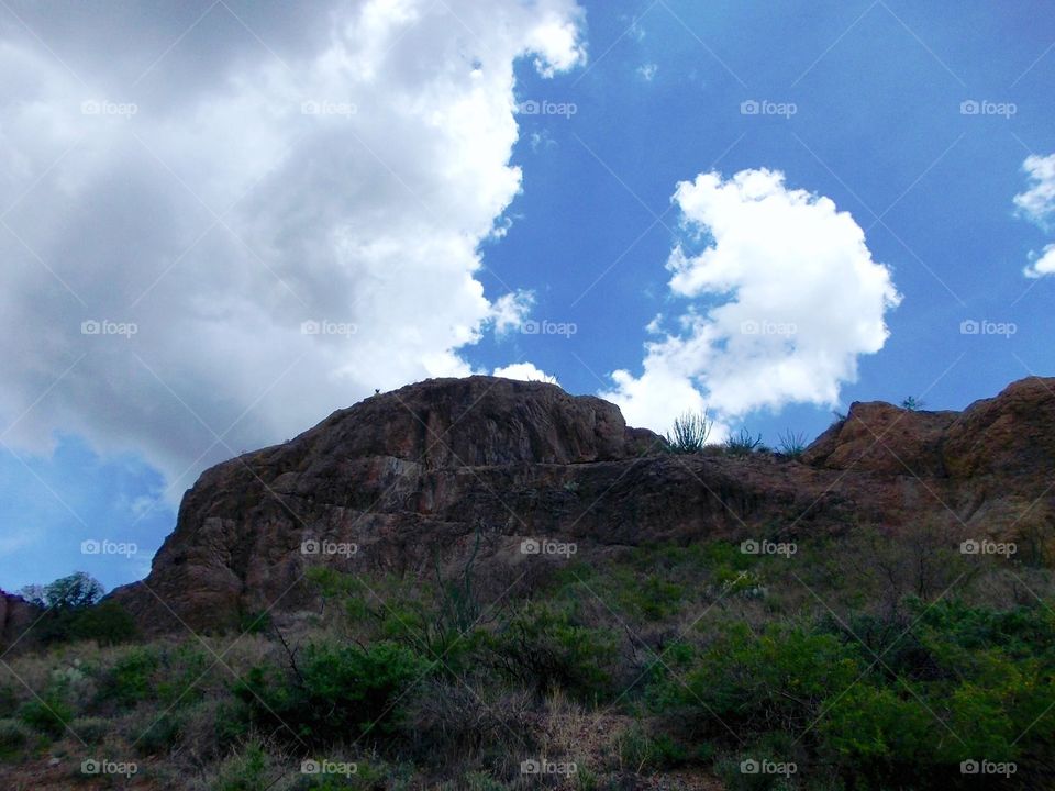 Cloud positioned just right for volcano effect . Looks like a volcano