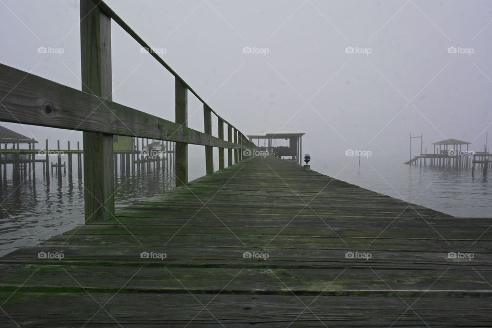 Low angle view of the fog on the bay