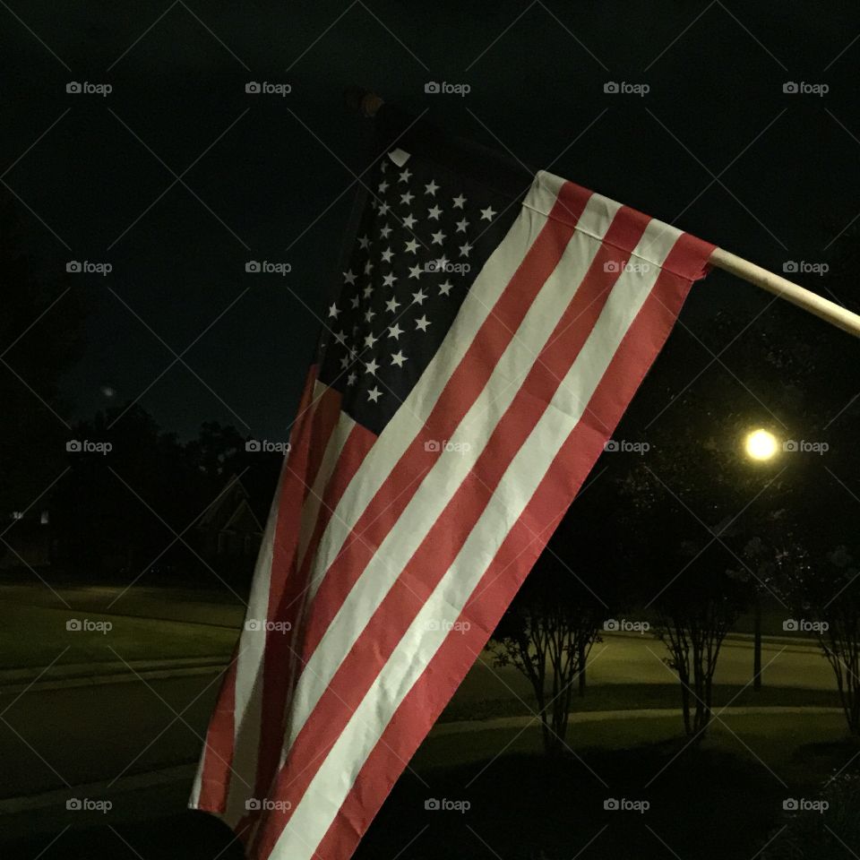 American flag at night