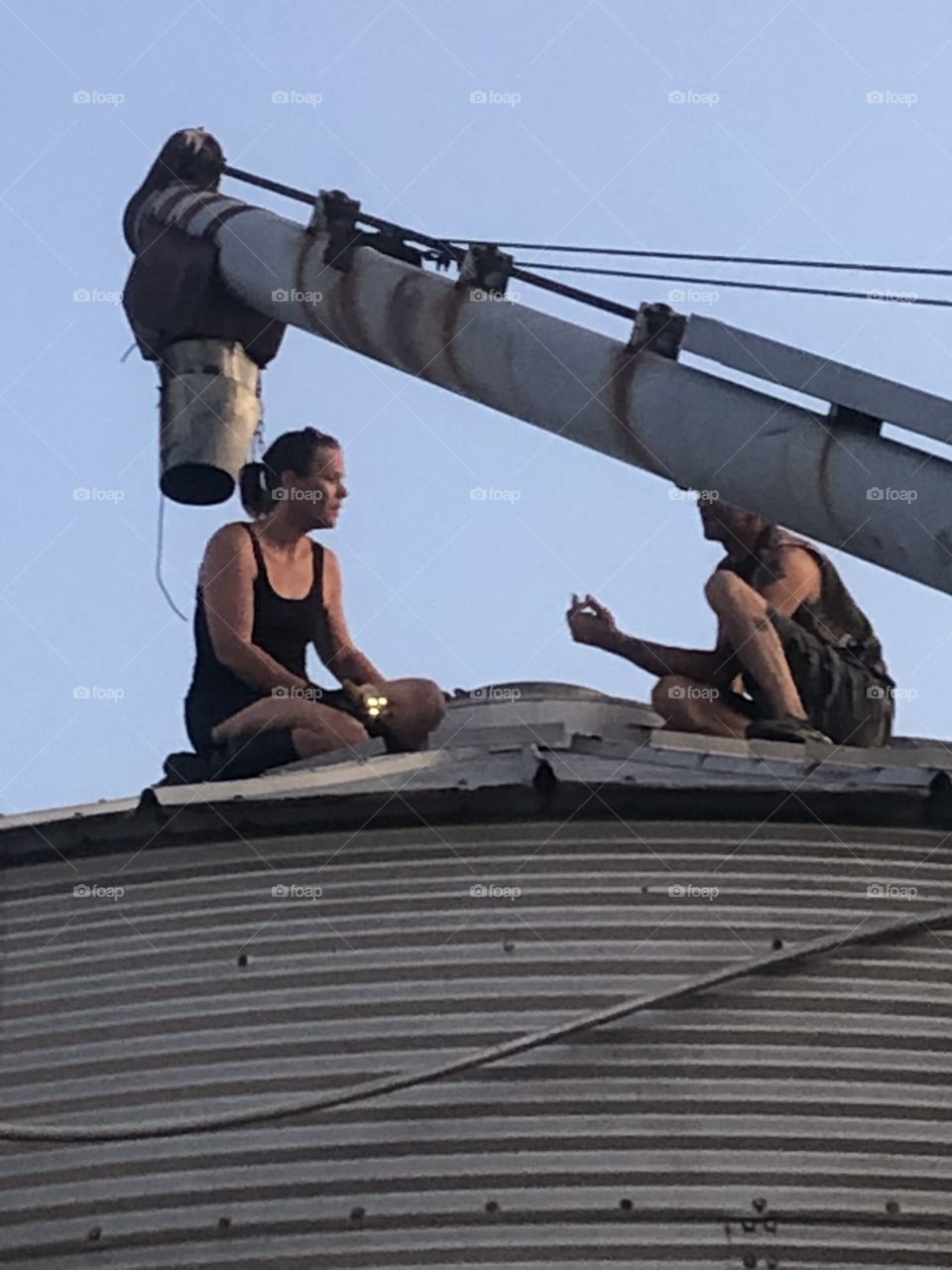 Grain bins aren’t just for storing grain. They also serve as a spot to discuss taking one apart and putting it back together somewhere else. We salvage unused grain bins for people the reuse as houses, outdoor entertaining areas, or whatever.