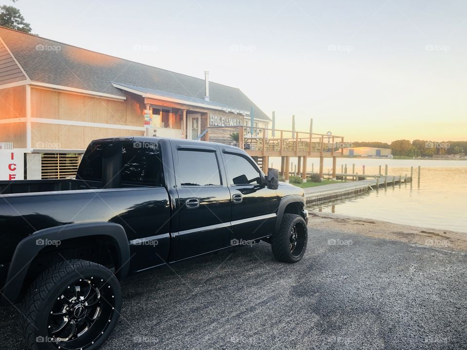 2500 blacked out duramax on the waterfront  