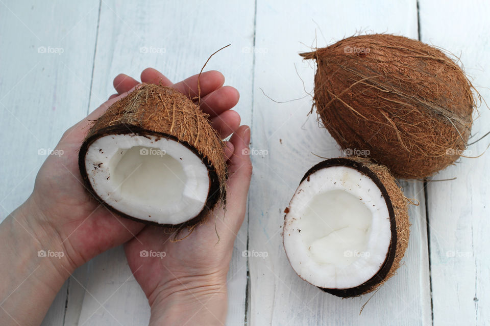 Coconut, fruit, food, hands, still life, abstraction, coconut in hands, cut coconut in hands, whole coconut, broken coconut