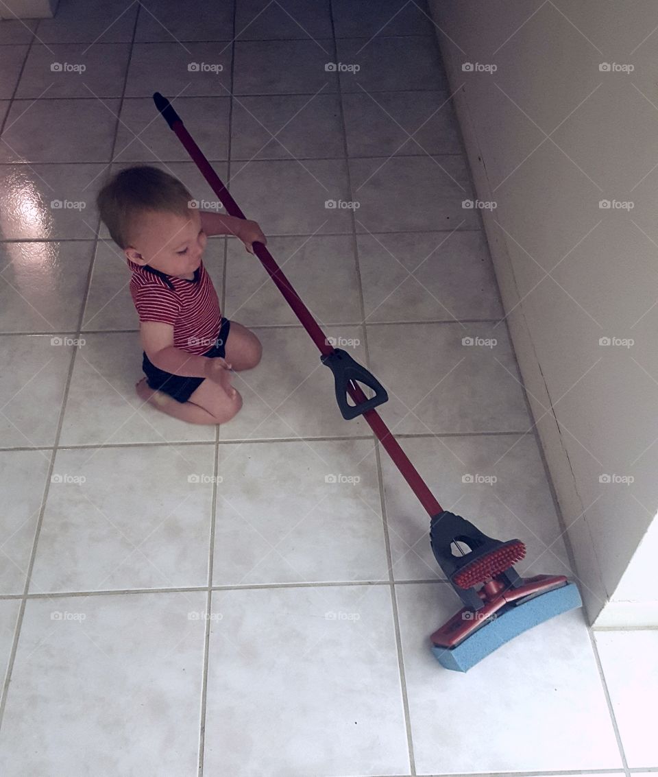 Baby Wanting to Clean