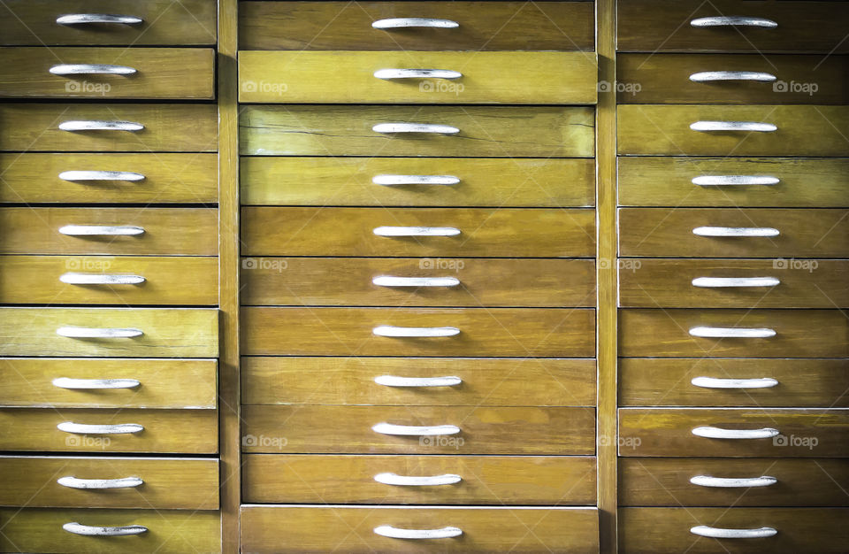 Old vintage wooden chest of drawers background