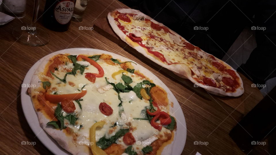 A Vegetarian Pizza And A Meat Pizza - Lots Of Melted Cheese - Pizzaria