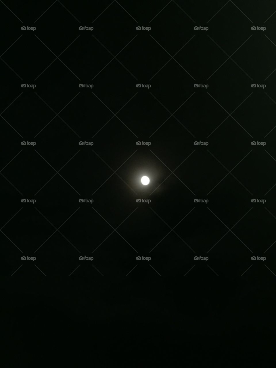 The moon shining outside my bedroom window so clear 