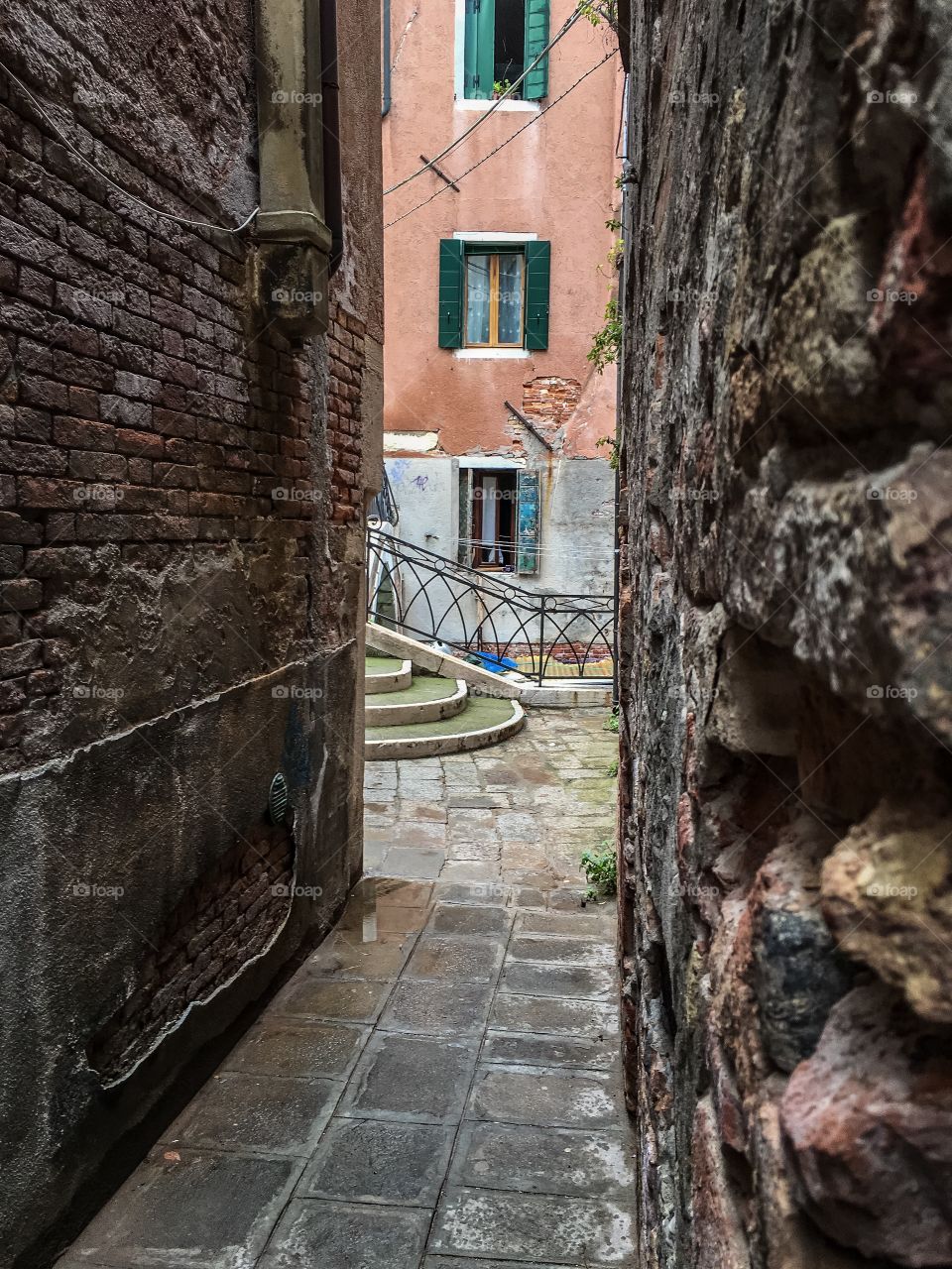Narrow alley in old town in Venezia, Venice