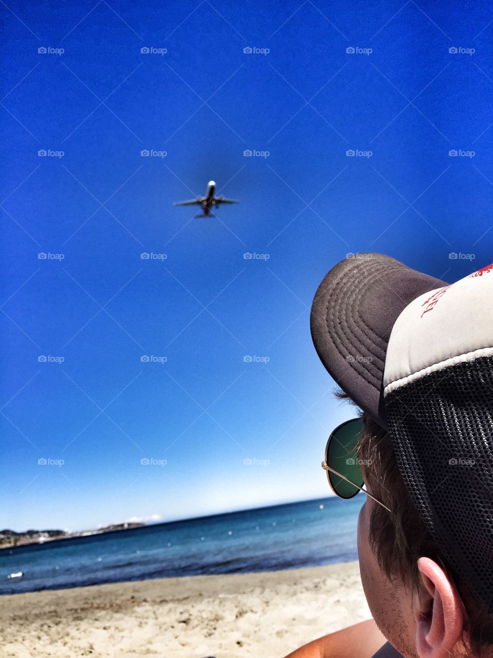 Man watching a plane