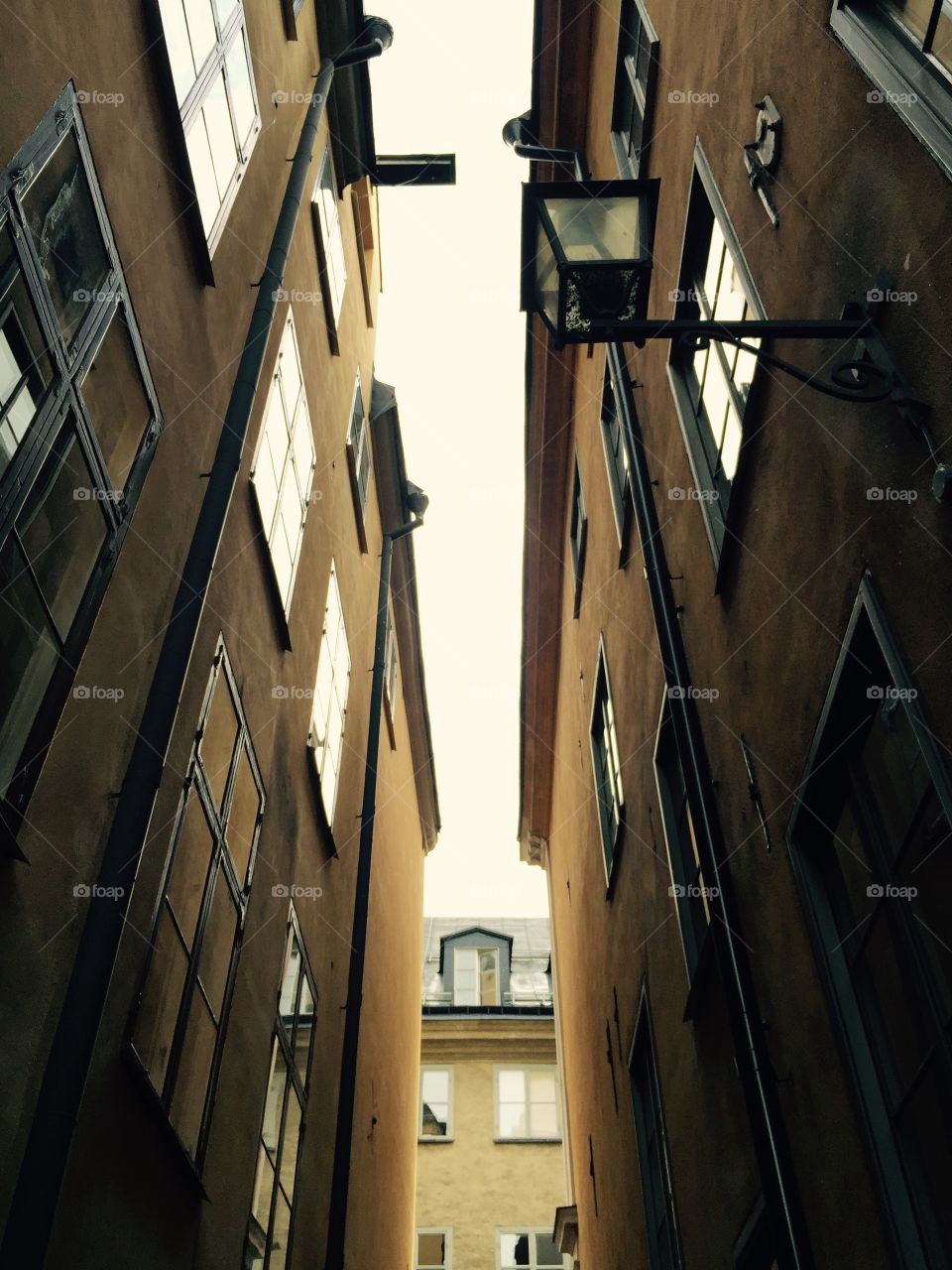 In a maze of Old Town. Upper view of a narrow european street