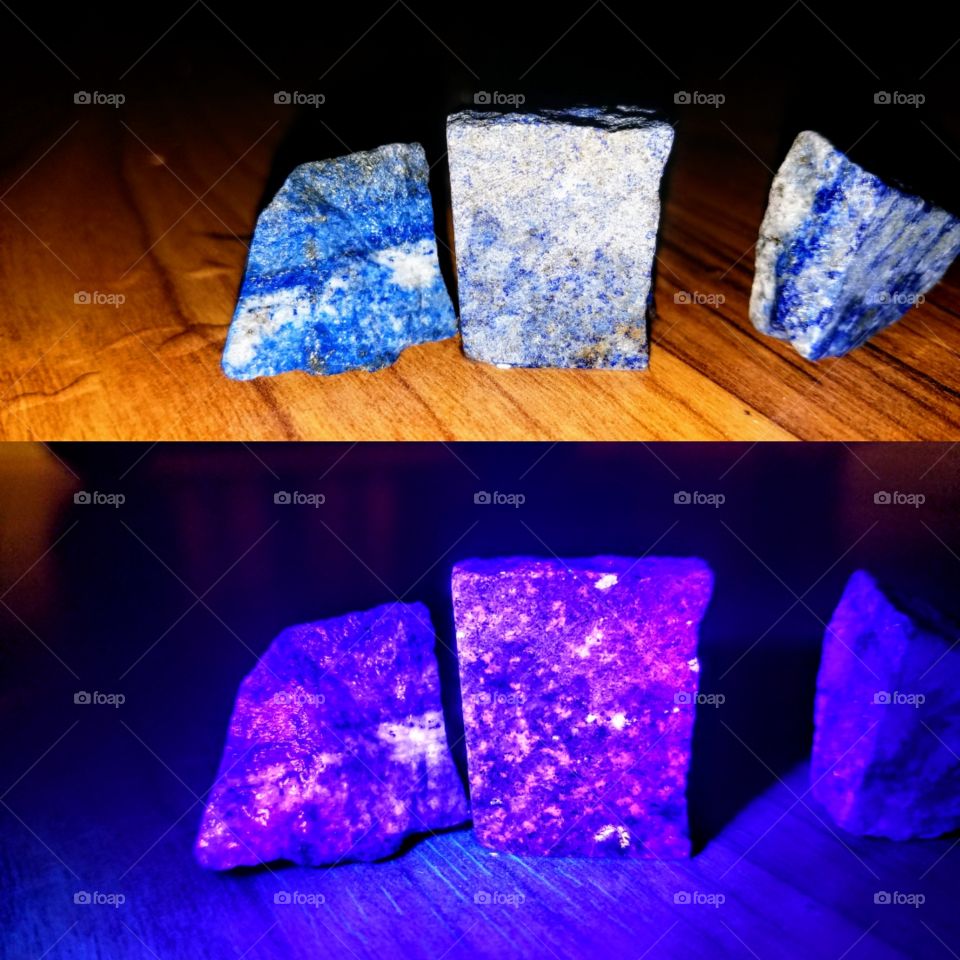 I just got a new long wave uv/ black light flashlight and have been playing with my minerals & crystal specimens. This is lapis lazuli, sodalite & hackmanite w/ regular light and long wave uv lights.