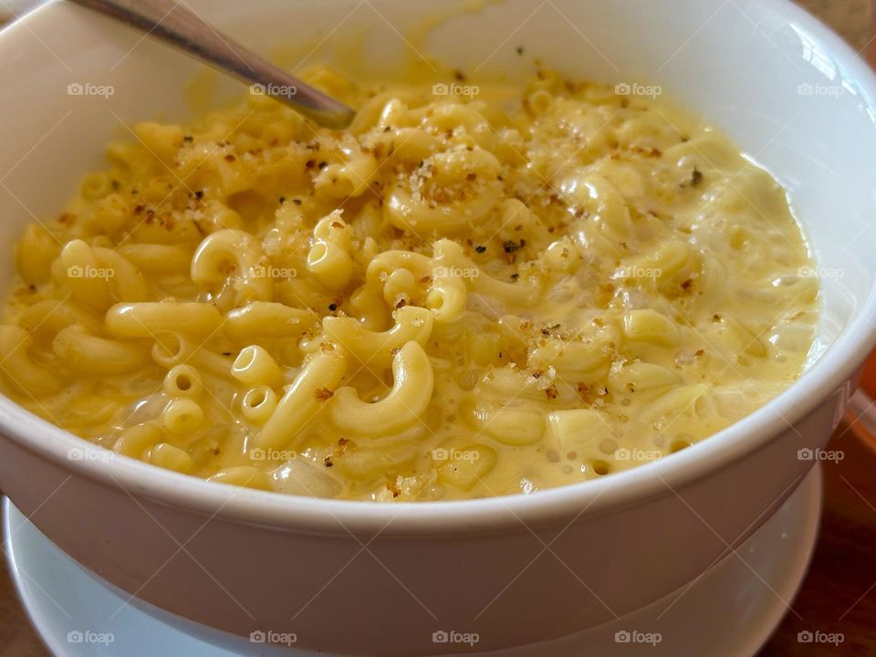 American favorite- Piping hot Mac and cheese - Food nourishes us, delights us, and generally fuels our daily lives