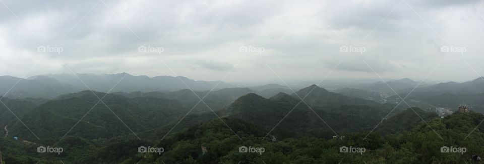 View from atop a high hill on the Great Wall of China