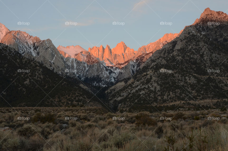 The sunrise casting a orange glow on the high Sierras!