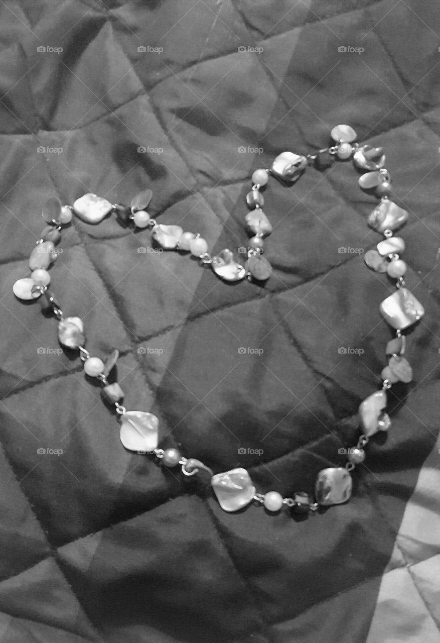 A black and white photo of my jewelry.