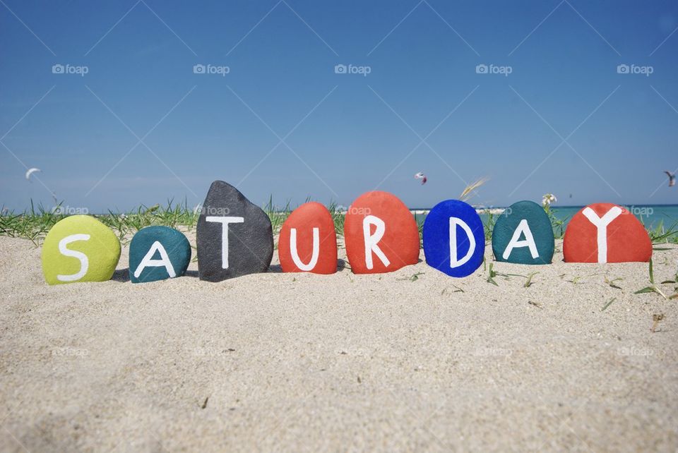 Saturday, sixt day of the week on colourful stones