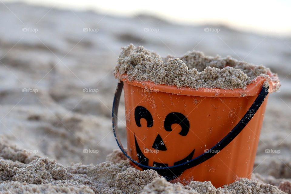 Halloween trick or treat basket on the beach