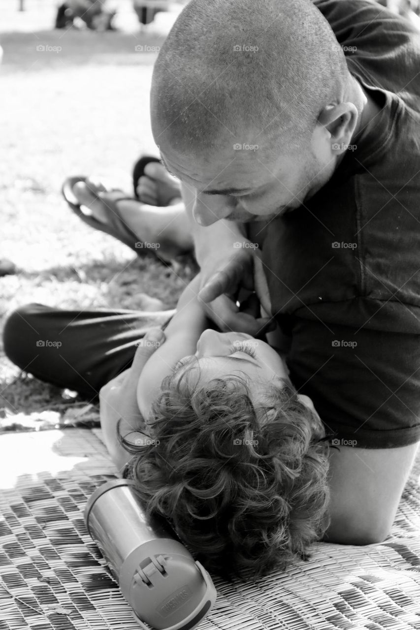 Father and son cuddling 