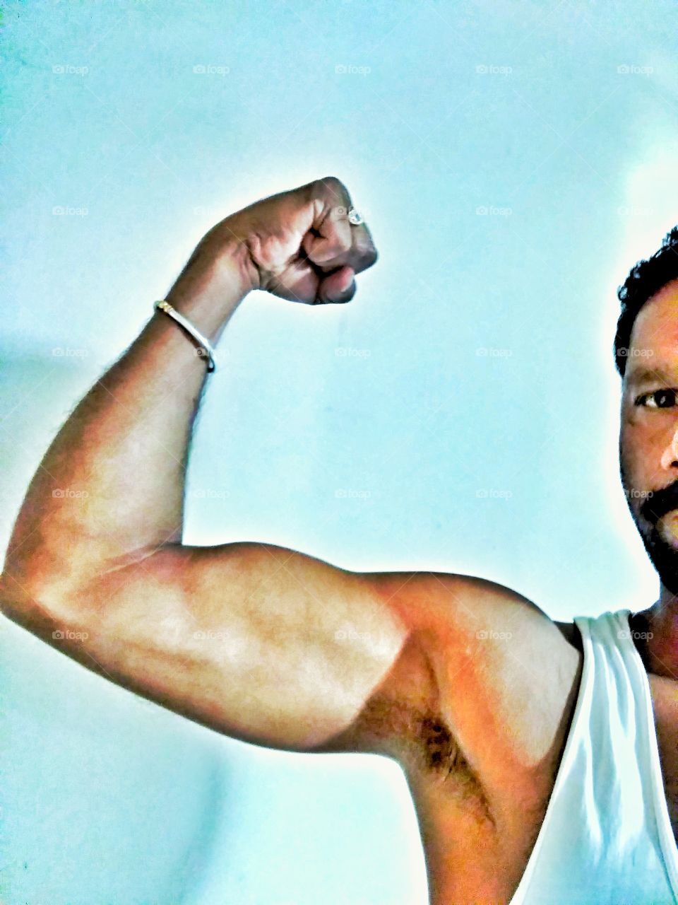 A man flexing his muscle