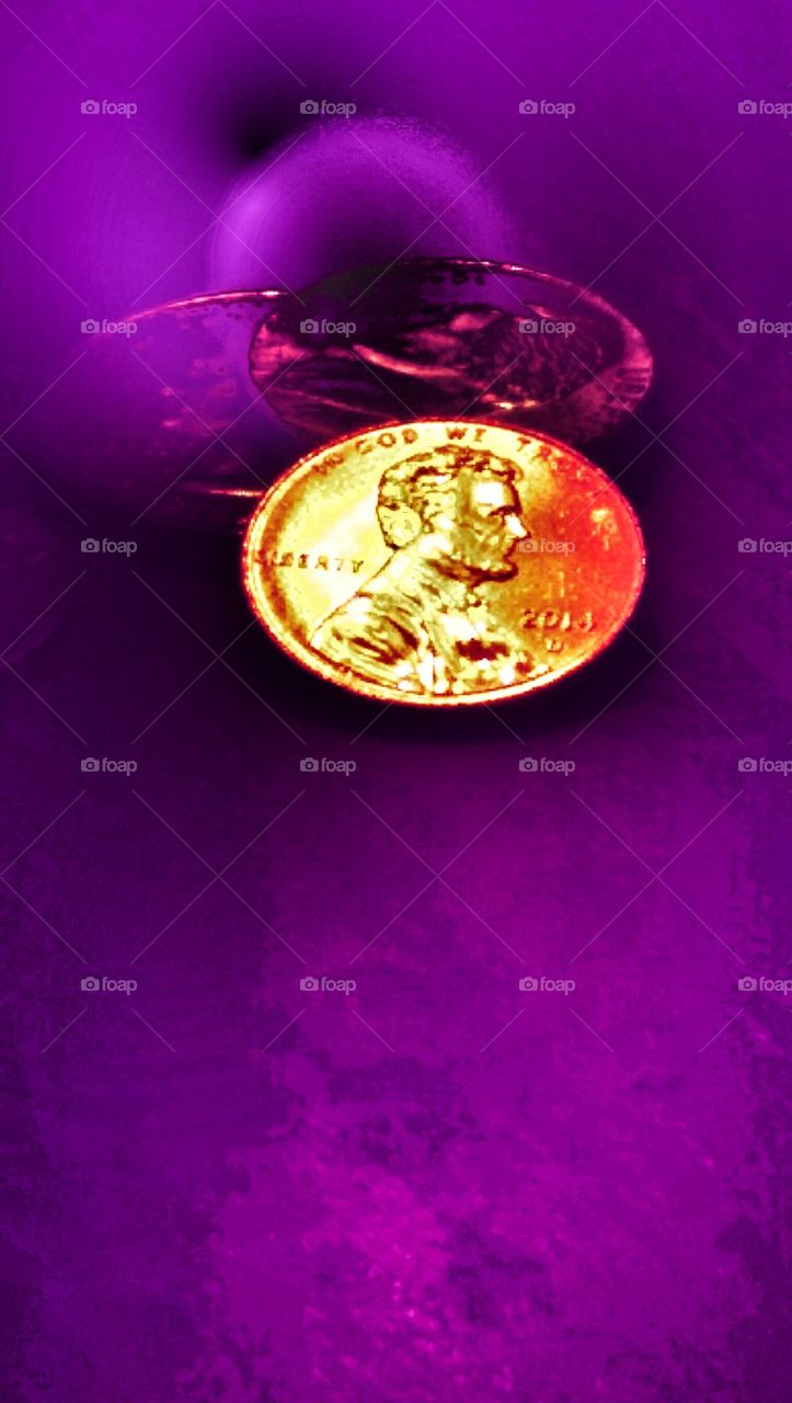 Copper Coin on Purple