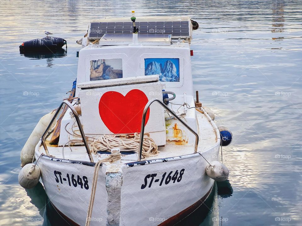 nice boat with a romantic painted red heart