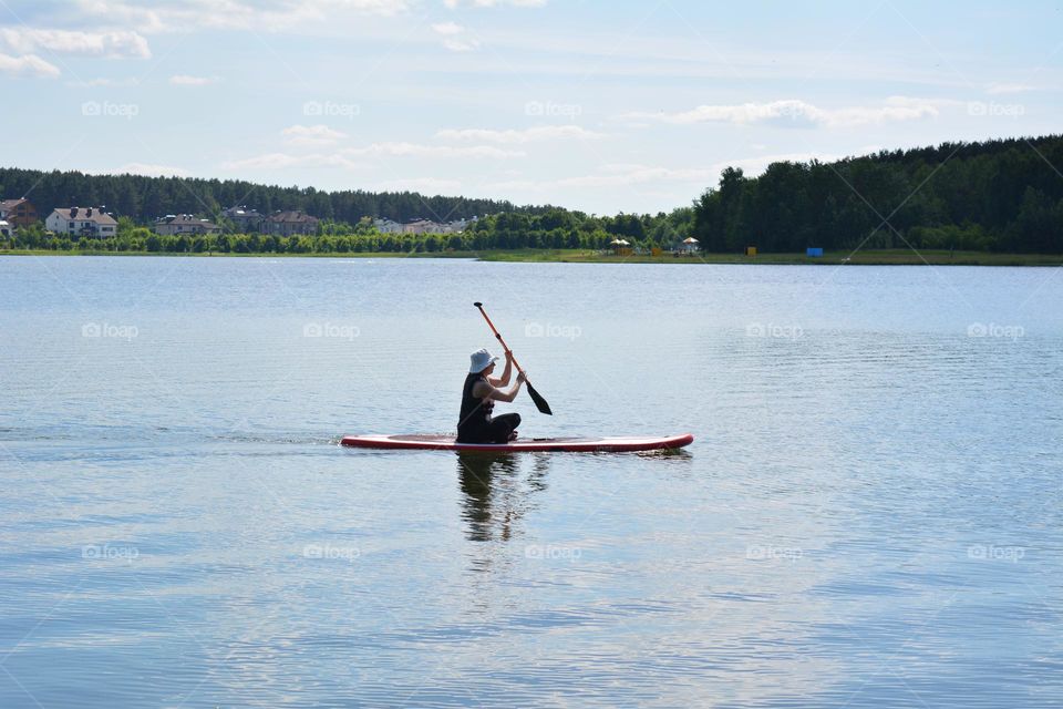 woman on a boat summer time